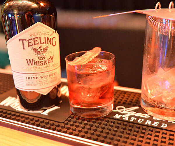 Old Fashioned Cocktail with Teelings Whiskey, Sugar Syrup and Bitters we smoke the old fashioned for 24 hours with the dried bacon