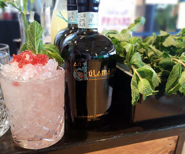 Bespoke Seaside Bramble Cocktail with Seaweed Gin & Homemade Blackberry Caviar.